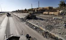 A military vehicle of the Iraqi security forces is driven in the streets of Ramadi, January 16, 2016. PHOTO BY REUTERS/Thaier Al-Sudani