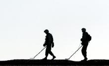 U.S. army mine sweepers search for mines on the outskirts of Ramadi December 10, 2003. PHOTO BY REUTERS/Goran Tomasevic