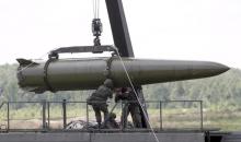 Russian servicemen equip an Iskander tactical missile system at the Army-2015 international military-technical forum in Kubinka, outside Moscow, Russia, in this June 17, 2015 file photo. PHOTO BY REUTERS/Sergei Karpukhin