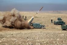 Members of the Iraqi rapid response forces fire a missile toward Islamic State militants during a battle in south of Mosul, Iraq, February 19, 2017. PHOTO BY REUTERS/Khalid al Mousily