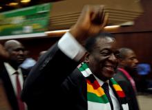 Zimbabwean President Emmerson Mnangagwa greets supporters of his ruling Zimbabwe African National Union – Patriotic Front (ZANU–PF) party at a rally in Harare, Zimbabwe, March 7, 2018. PHOTO BY REUTERS/Philimon Bulawayo