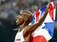 Mo Farah of Britain reacts after winning the men's 5000m event during the 15th IAAF World Championships at the National Stadium in Beijing, China, August 29, 2015. PHOTO BY REUTERS/Lucy Nicholson