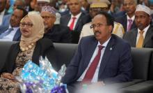 Somalia's newly elected President Mohamed Abdullahi Farmaajo and his wife Zeinab Abdi listen to speeches during his inauguration ceremony in Somalia's capital Mogadishu, February 22, 2017. PHOTO BY REUTERS/Feisal Omar