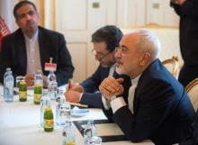Iranian Foreign Minister Mohammad Javad Zarif meets with French Foreign Minister Laurent Fabius (not pictured) at a hotel in Vienna, Austria, June 27, 2015. PHOTO BY REUTERS/Christian Bruna