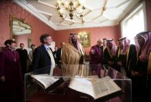 Britain's Archbishop of Canterbury Justin Welby shows The Crown Prince of Saudi Arabia Mohammed bin Salman a selection of early texts from the Christian, Muslim and Jewish faiths from the Lambeth Palace library collection during a private meeting at Lambeth Palace, London, Britain, March 8, 2018. PHOTO BY REUTERS/Yui Mok