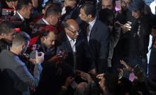 Tunisia's President Moncef Marzouki (C) greets supporters during a re-election campaign in Tunis, December 19, 2014. PHOTO BY REUTERS/Zoubeir Souissi
