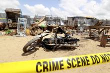 A motorbike is seen at the scene of a bomb blast at Kuje market in Abuja, Nigeria, October 3, 2015. PHOTO BY REUTERS/Afolabi Sotunde