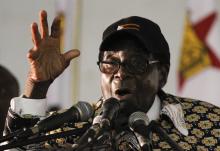 Zimbabwe President Robert Mugabe speaks at the opening of the ZANU-PF annual People's Conference in Chinhoyi, north-west of Harare