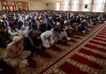 KABUL (Reuters) - Muslims around the world celebrated the Eid-al-Fitr religious holiday on Tuesday, marking the end of Islam’s holy month of Ramadan.  Like the start of Ramadan, during which believers abstain from eating and drinking during daylight hours, Eid-al-Fitr depends on the sighting of the moon and its celebration varies in different countries. The day begins with early morning prayers and then family visits and feasts.  In the Afghan capital Kabul, families celebrated with a stroll in a central pa