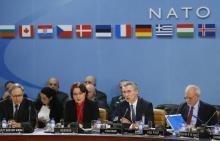 Georgia's Minister of Defence Tinatin Khidasheli (L) and NATO Secretary General Jens Stoltenberg (R) address a NATO-Georgia Commission defense ministers meeting at the Alliance's headquarters in Brussels, February 11, 2016. PHOTO BY REUTERS/Yves Herman