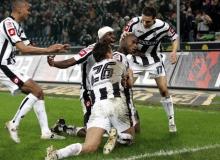 Borussia Moenchengladbach's Nando Rafael (2R) celebrates his last minute equalizing goal with team mates Marvin Compper (L), Steve Gohouri (C back), Michael Delura (C front) and David Degen (R) during a match in a file photo. PHOTO BY  REUTERS/Alex Grimm