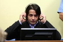 Former Bosnian Muslim commander Naser Oric, accused of killing Bosnian Serbs and destroying their villages, awaits his verdict at the U.N. war crimes tribunal in The Hague, Netherlands, June 30, 2006. PHOTO BY REUTERS/ Zoran Lesic