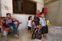 Noura Khodr Khalaf, 24, a Yazidi woman who was recently freed from Islamic State, poses with her children in a centre belonging to the Kurdish-led administration in Qamishli, Syria, June 10, 2017. PHOTO BY REUTERS/Rodi Said