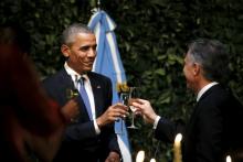 U.S. President Barack Obama attends a state dinner at the Centro Cultural Kirchner accompanied by Argentina's President Mauricio Macri as part of President Obama's two-day visit to Argentina, in Buenos Aires, March 23, 2016. PHOTO BY REUTERS/Carlos Barria