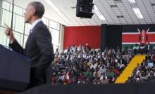 People listen as U.S. President Barack Obama delivers remarks at an indoor stadium in Nairobi July 26, 2015. Obama told Kenyans on Sunday on his first presidential trip to his father's homeland that there was "no limit to what you can achieve" but said they had to deepen democracy, tackle corruption and end exclusion based on gender or ethnicity. PHOTO BY REUTERS/Jonathan Ernst