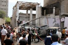 Yemeni officials inspect the damages after a car bomb ripped through a military kitchen in Aden, Yemen, March 13, 2018. PHOTO BY REUTERS/Fawaz Salman