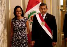 Peru's President Ollanta Humala, accompanied by First Lady Nadine Heredia, arrives at the swearing-in ceremony of new members of his cabinet at the government palace in Lima, Peru, February 24, 2014. PHOTO BY REUTERS/Mariana Bazo