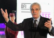 Egyptian veteran actor Omar al-Sharif poses on the red carpet as he arrives at the opening of the 2011 Doha Tribeca Film Festival in Doha, October 25, 2011. PHOTO BY REUTERS/Mohammed Dabbous