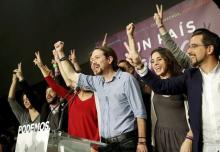 Podemos (We Can) party leader Pablo Iglesias (C) reacts with party members after results were announced in Spain's general election in Madrid, Spain, December 20, 2015. PHOTO BY REUTERS/Andrea Comas