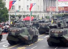 AAV-P7A1 amphibious assault vehicles of the Taiwan Marine Corps are part of a parade during Taiwan's National Day celebrations in front of the Presidential Office in Taipei, October 10, 2011. PHOTO BY REUTERS/Pichi Chuang
