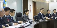 South Korean President Park Geun-hye (C) presides over the National Security Council at the Presidential Blue House in Seoul, South Korea, in this handout picture provided by the Presidential Blue House and released by Yonhap on January 6, 2016. PHOTO BY REUTERS/Yonhap