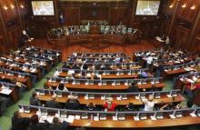 Kosovar Members of Parliament sit in the Assembly during a summer session in Pristina, August 3, 2015. PHOTO BY REUTERS/Hazir Reka