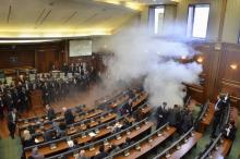 Opposition politicians release tear gas in parliament to obstruct a session in Pristina, Kosovo, February 19, 2016. PHOTO BY REUTERS/Agron Beqiri