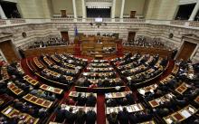 Greek Prime Minister Alexis Tsipras delivers his first major speech in parliament in Athens, February 8, 2015. PHOTO BY REUTERS/Kostas Tsironis