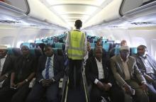 A member of Daallo Airlines ground crew walks down an aisle inside their airline at Aden Abdule International Airport in Somalia's capital Mogadishu in a file photo. PHOTO BY REUTERS/Feisal Omar