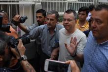 U.S. pastor Andrew Brunson reacts as he arrives at his home after being released from the prison in Izmir, Turkey, July 25, 2018. PHOTO BY REUTERS/Demiroren News Agency, DHA