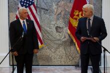 U.S. Vice President Mike Pence and Montenegrin Prime Minister Dusko Markovic look at each other ahead of their meeting in Podgorica, Montenegro, August 2, 2017. PHOTO  BY REUTERS/Stevo Vasiljevic