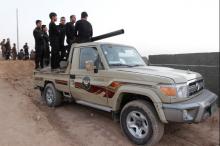 Kurdish Peshmerga fighters ride in a vehicule in the Southwest of Kirkuk, Iraq, October 13, 2017. PHOTO BY REUTERS/Ako Rasheed
