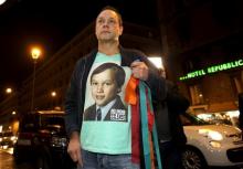 Peter Blenkiron, a child sex abuse victim, wears a T-shirt with the words "No More Silence" in front of the Quirinale hotel in Rome, Italy, March 2, 2016. PHOTO BY REUTERS/Max Rossi