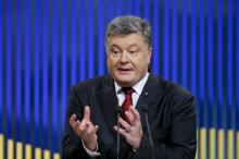 Ukrainian President Petro Poroshenko gestures during a news conference in Kiev, Ukraine, January 14, 2016. PHOTO BY REUTERS/Gleb Garanich
