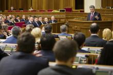 Ukraine's President Petro Poroshenko (R, top) delivers a speech during a session of the parliament in Kiev, November 27, 2014. Petro Poroshenko said on Thursday 100 percent of Ukrainians were in favour of a having single state, without federalisation, in a keynote address to the first session of a new parliament. REUTERS/Mikhail Palinchak