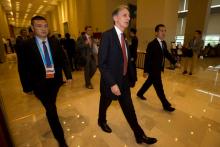 Britain's Chancellor of the Exchequer Philip Hammond (C) walks to a meeting during the G20 Finance Ministers and Central Bank Governors conference held in Chengdu in Southwestern China's Sichuan province, July 23, 2016. PHOTO BY REUTERS/Ng Han Guan