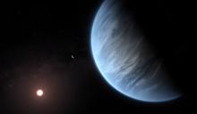 An artist's impression released by NASA on September 11, 2019 shows the planet K2-18b, its host star and an accompanying planet. PHOTO BY REUTERS/ESA/Hubble/M. Kornmesser/NASA 