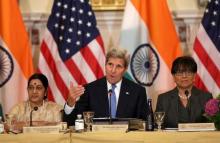 U.S. Secretary of State John Kerry (C) participates with India's Minster of External Affairs Minister Sushma Swaraj (L) and U.S. Commerce Secretary Penny Pritzker (R) at the U.S-India Strategic & Commercial Dialogue plenary session at the State Department in Washington, September 22, 2015. PHOTO BY REUTERS/Gary Cameron