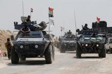 Iraqi federal police advance towards Falluja, Iraq, May 24, 2016. PHOTO BY REUTERS/Thaier Al-Sudani