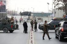 Members of the Afghan security forces stand at the site of a blast and gunfire in Kabul, Afghanistan, March 8, 2017. PHOTO BY REUTERS/Mohammad Ismail