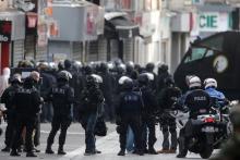 Members of French special police forces of the Research and Intervention Brigade (BRI) are seen near a raid zone in Saint-Denis, near Paris, France, November 18, 2015 during an operation to catch fugitives from Friday night's deadly attacks in the French capital. PHOTO BY REUTERS/Christian Hartmann