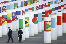 French police officers patrol in front of the entrance at the venue for the World Climate Change Conference 2015 (COP21) at Le Bourget, near Paris, France, November 29, 2015. PHOTO BY REUTERS/Stephane Mahe