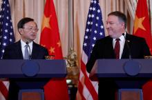 U.S. Secretary of State Mike Pompeo and Defense Secretary James Mattis listen to Chinese Communist Party Office of Foreign Affairs Director Yang Jiechi speak as they hold a joint media news conference after participating in a second diplomatic and security meeting at the U.S. Department of State, Washington, U.S., November 9, 2018. PHOTO BY REUTERS/Leah Millis