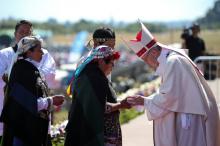 Mapuche people meet Pope Francis during a mass at the Maquehue Temuco Air Force base in Temuco, Chile, January 17, 2018. PHOTO BY REUTERS/Alessandro Bianchi