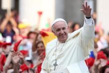 Pope Francis waves as he arrives to lead a special audience for members of the Renewal in the Holy Spirit movement in Saint Peter's square at the Vatican, July 3, 2015. PHOTO BY REUTERS/Alessandro Bianchi