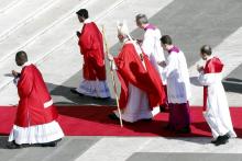 Pope Francis leaves the main altar as he leads the Palm Sunday mass at Saint Peter's Square at the Vatican, March 29, 2015. PHOTO BY REUTERS/Giampiero Sposito