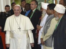 Pope Francis attends a meeting with inter-religious and ecumenical representatives at the apostolic nunciature in Nairobi, Kenya, November 26, 2015. PHOTO BY REUTERS/Daniel Dal Zennaro