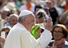 Pope Francis arrives to lead the weekly audience in Saint Peter's Square at the Vatican, April 6, 2016. PHOTO BY REUTERS/Alessandro Bianchi