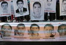 Relatives hold up posters during a rally in support of missing students from Ayotzinapa Teacher Training College, at the National Autonomous University of Mexico (UNAM) in Mexico City, February 19, 2015. PHOTO BY REUTERS/Henry Romero