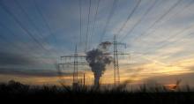 Genreal view of electricity pylons and power lines leading from a power plant. PHOTO BY REUTERS/Kai Pfaffenbach